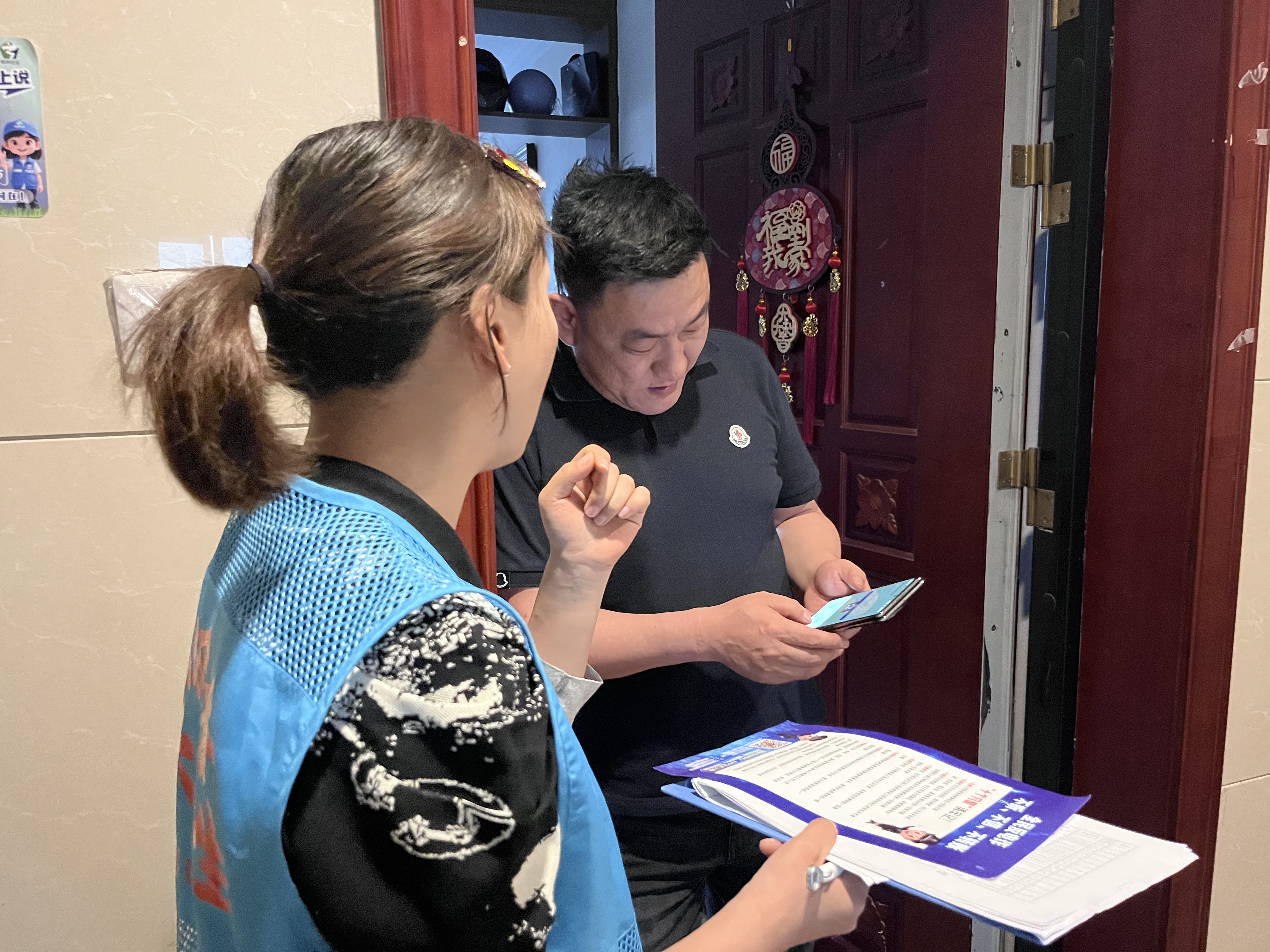 绿洲社区：深耕网格察民情 敲门反诈护平安